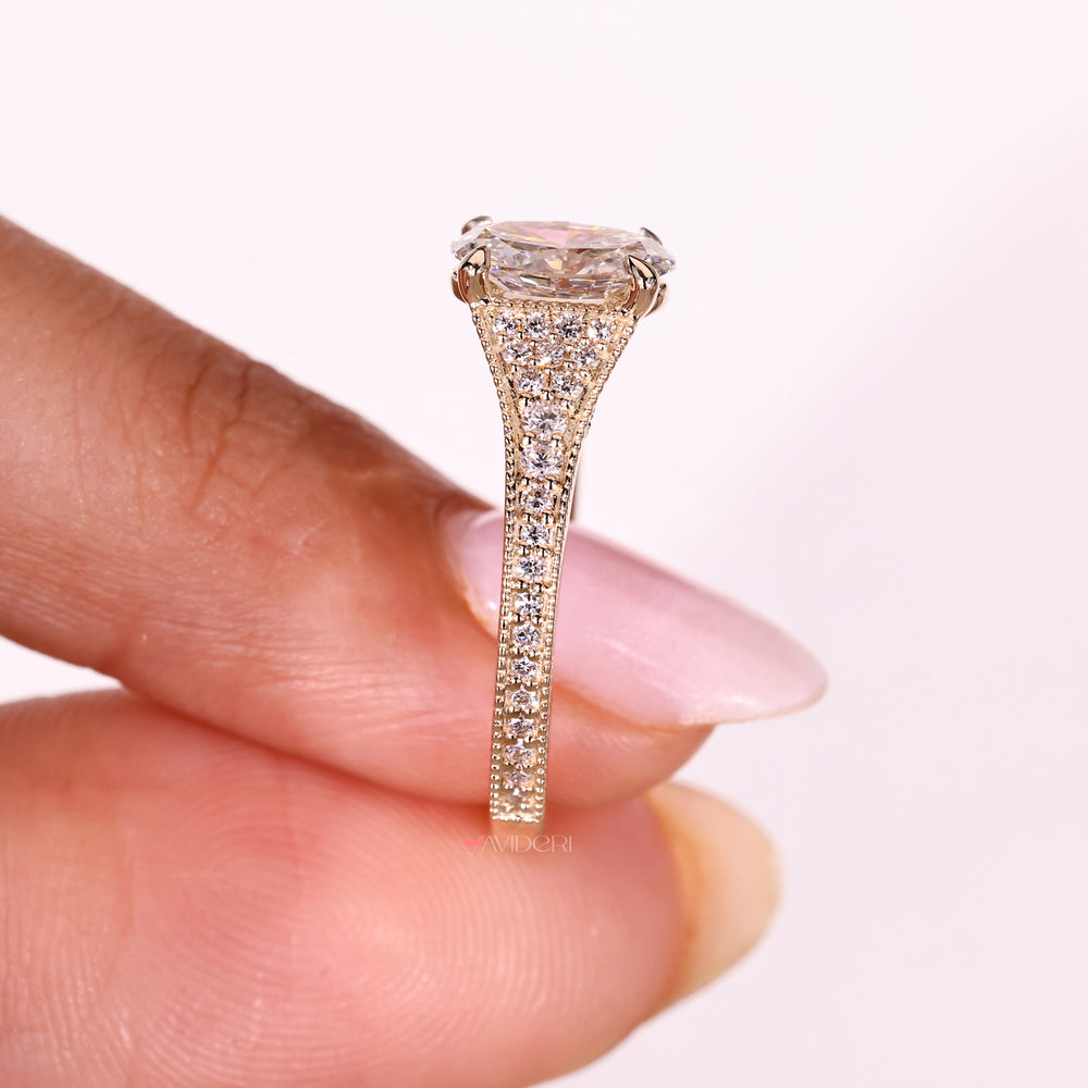 Vintage oval diamond ring milgrain setting.
