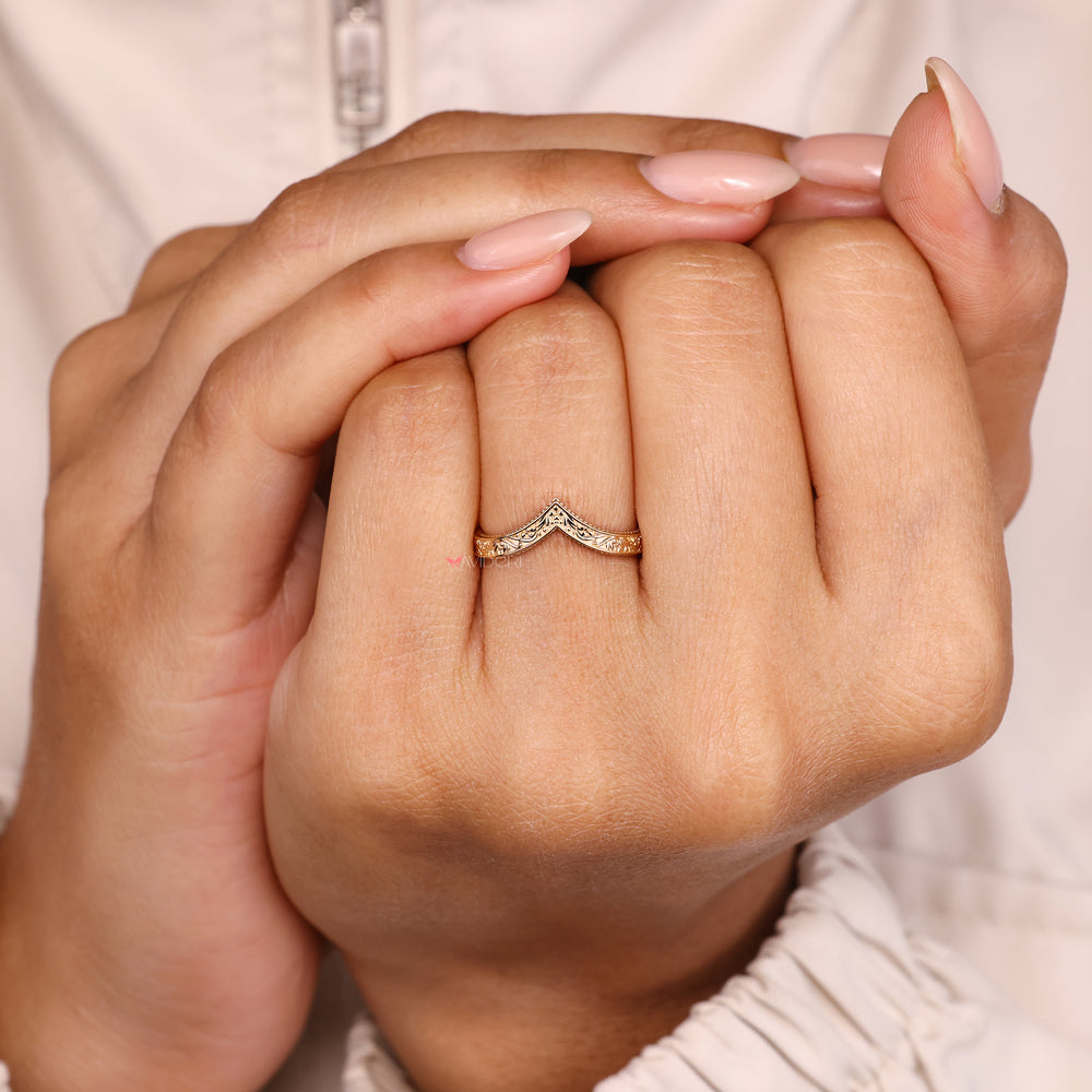 V shaped band with filigree and milgrain.
