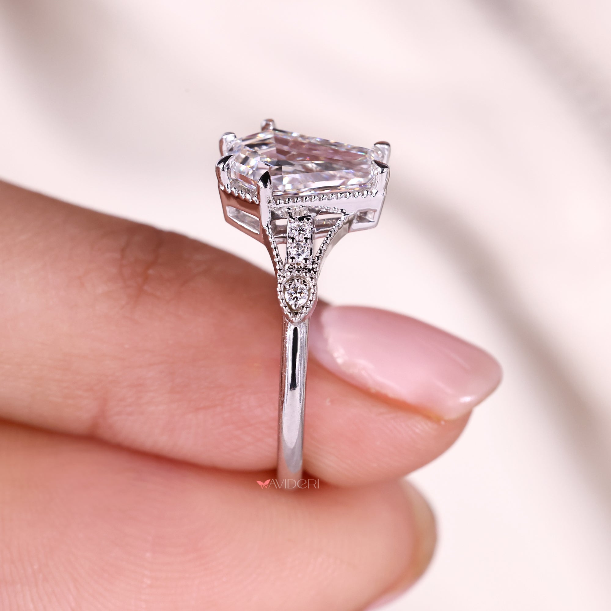 Milgrain setting ring on seven stone ring.