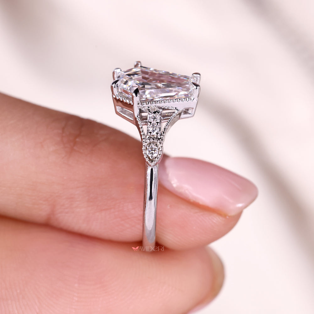 Milgrain setting ring on seven stone ring.