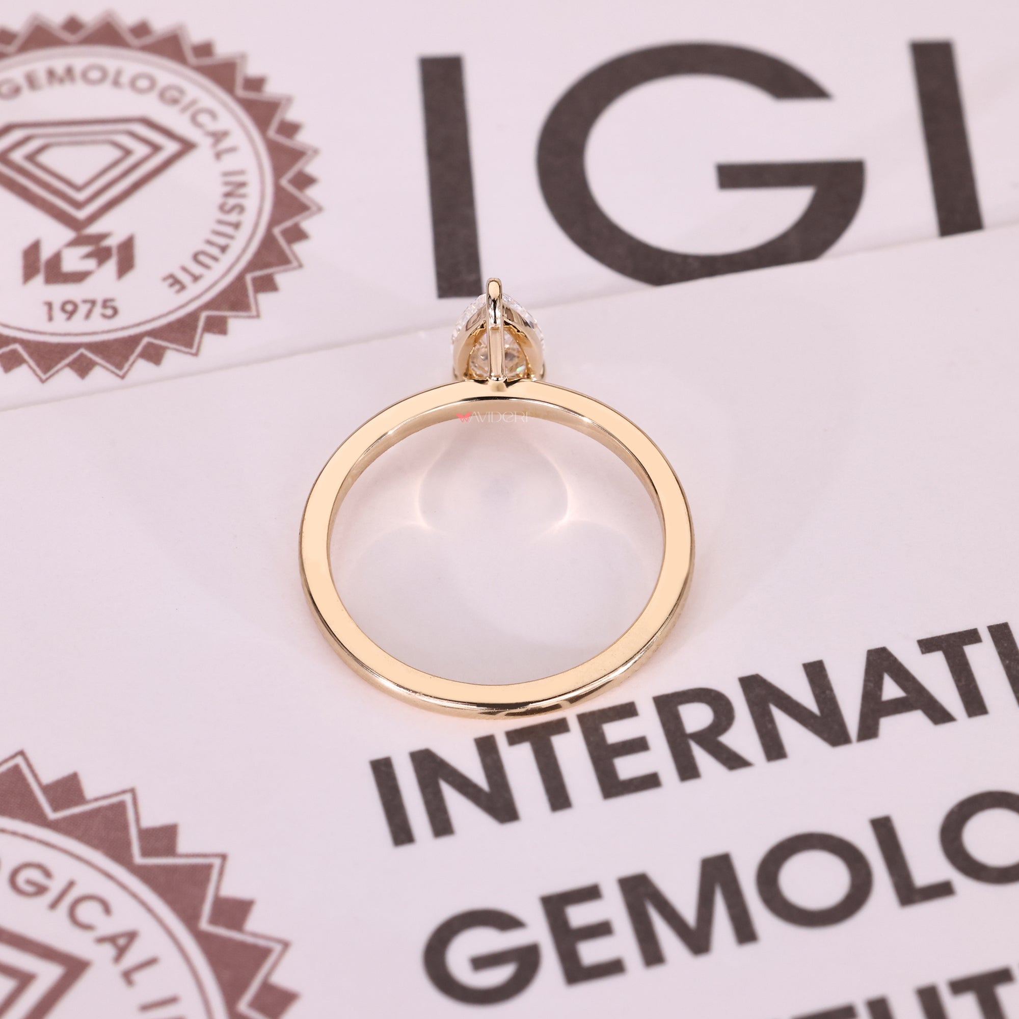 IGI certified pear cut diamond solitaire ring.
