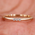 Round diamond band in a sleek, classic setting.
