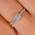 baguette and round diamond engagement ring in white gold with prong setting.