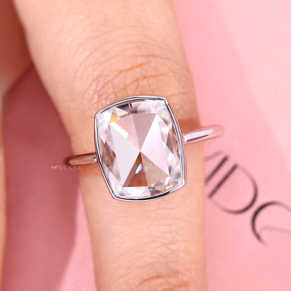 Classic bezel set cushion rose cut moissanite.
