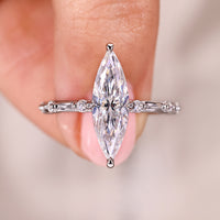 Marquise Cut Engagement Ring With Distance Pave