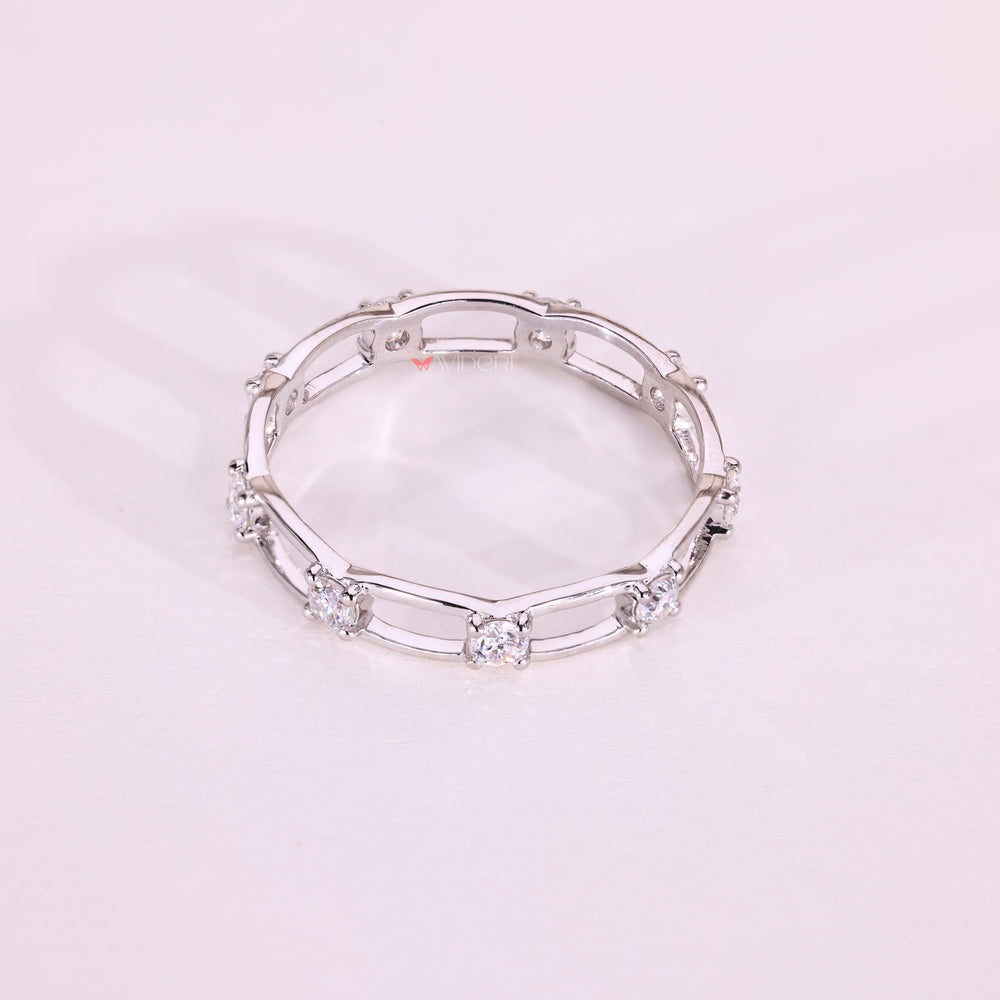 Elegant round moissanite eternity wedding ring.
