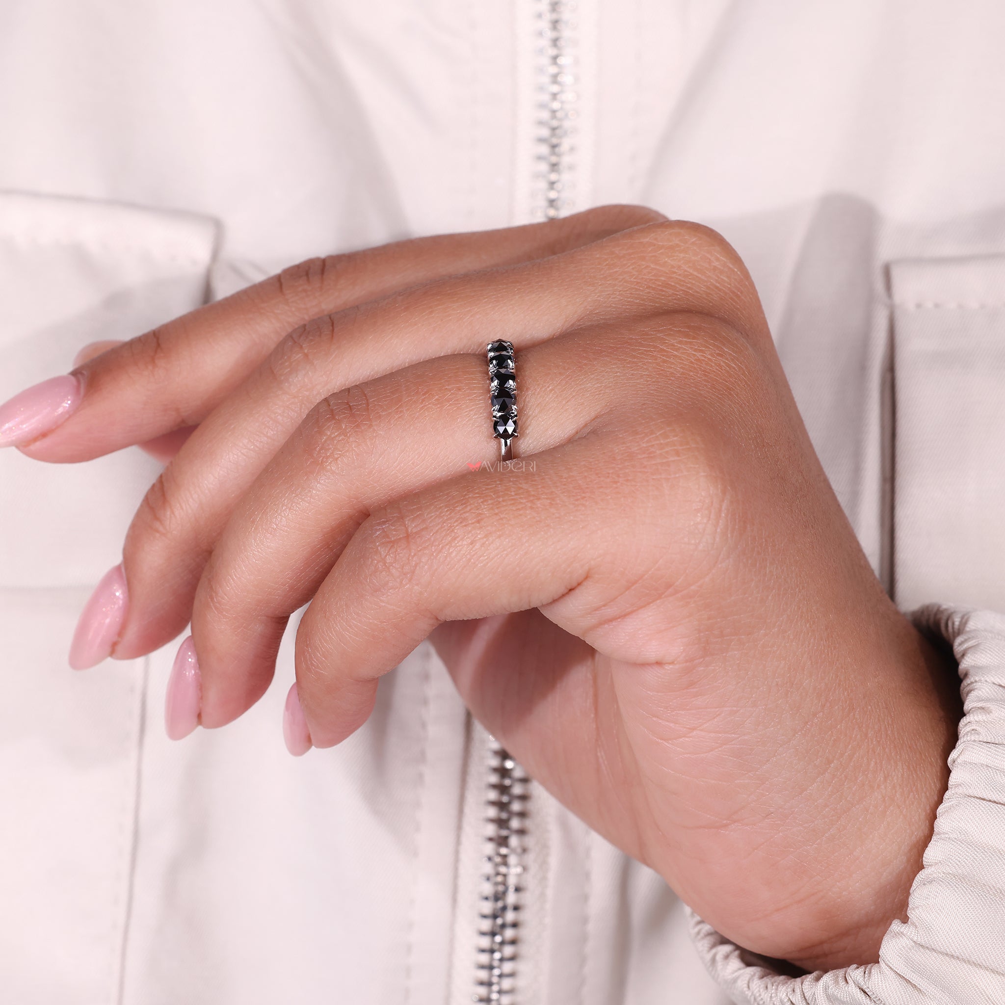 The white gold band provides a sleek, polished finish.