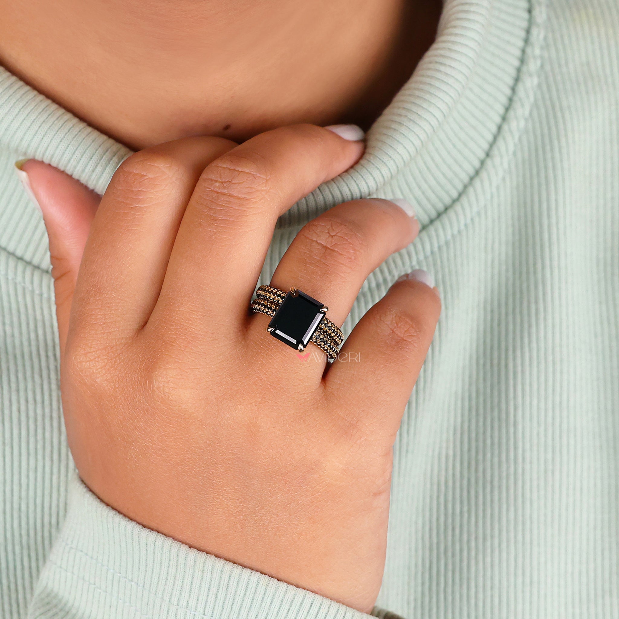 Moissanite bridal ring sets with emerald cut moissanite center stones.
