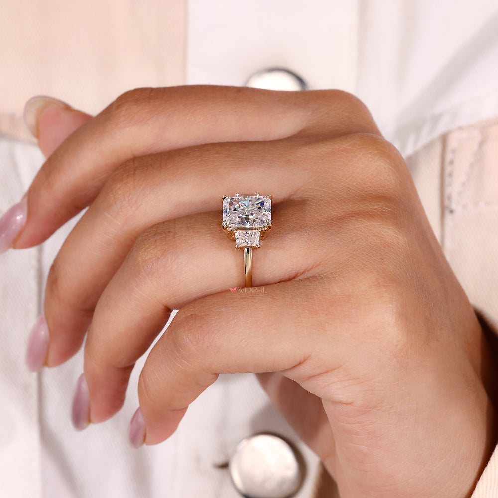 Radiant cut moissanite ring with claw prong setting.
