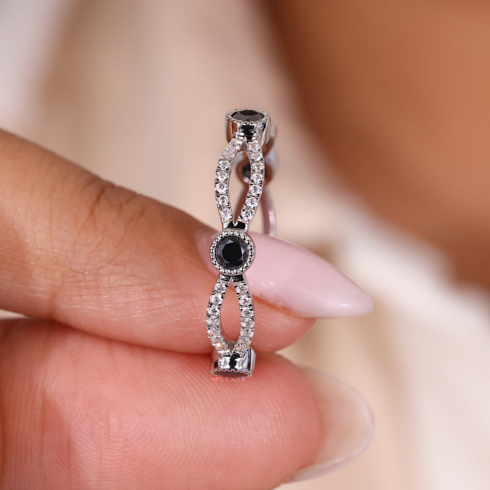 White gold wedding band with infinity wedding band details.
