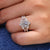 Ring jacket enhancer paired with a wedding band.
