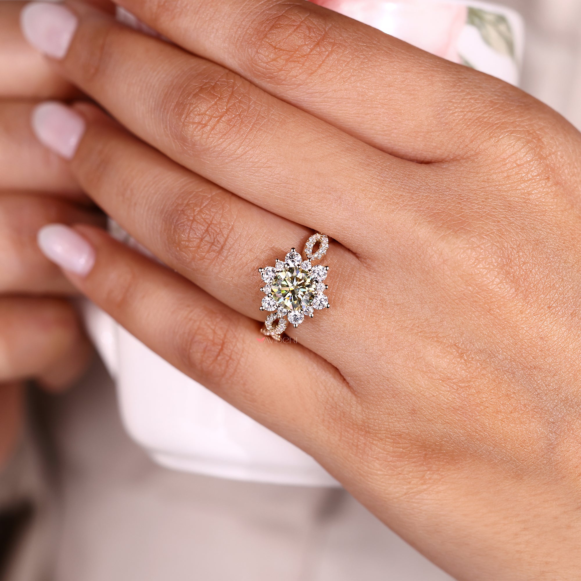 Round brilliant cut moissanite ring sparkles with perfect symmetry and clarity.
