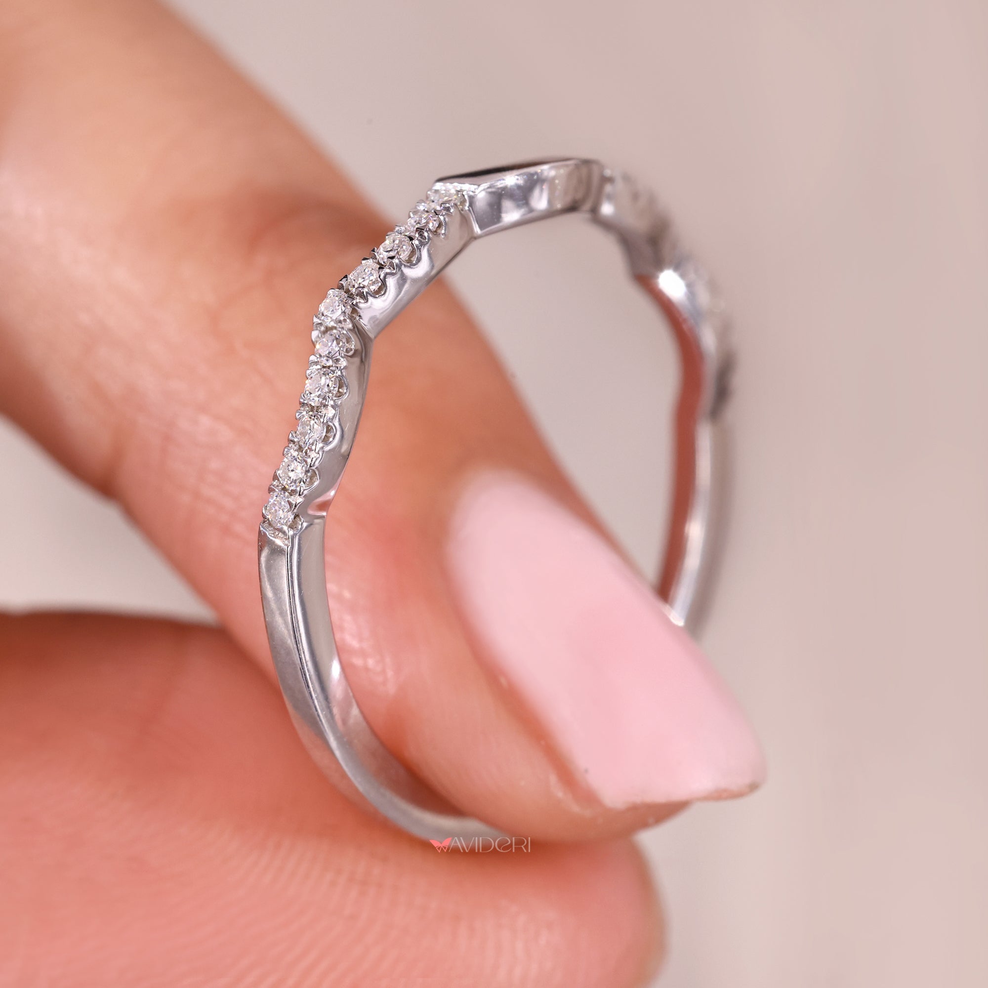 Half eternity wedding band with curved wedding band.