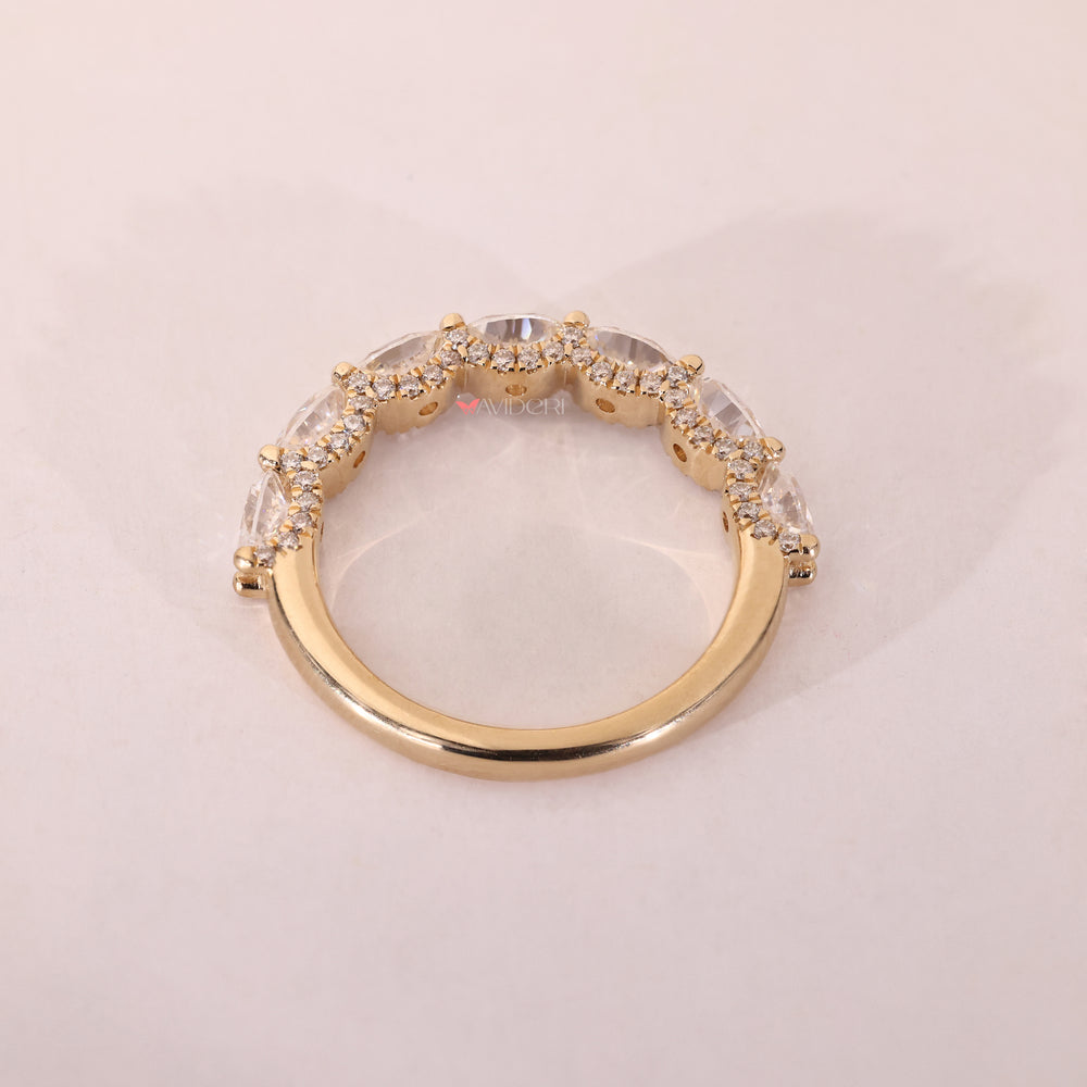 U prong micro pave band handmade with round moissanite set in precise detail.