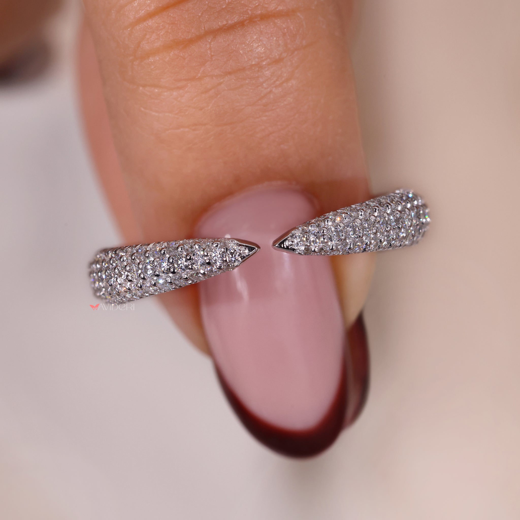 Avideri wedding band with round diamonds.
