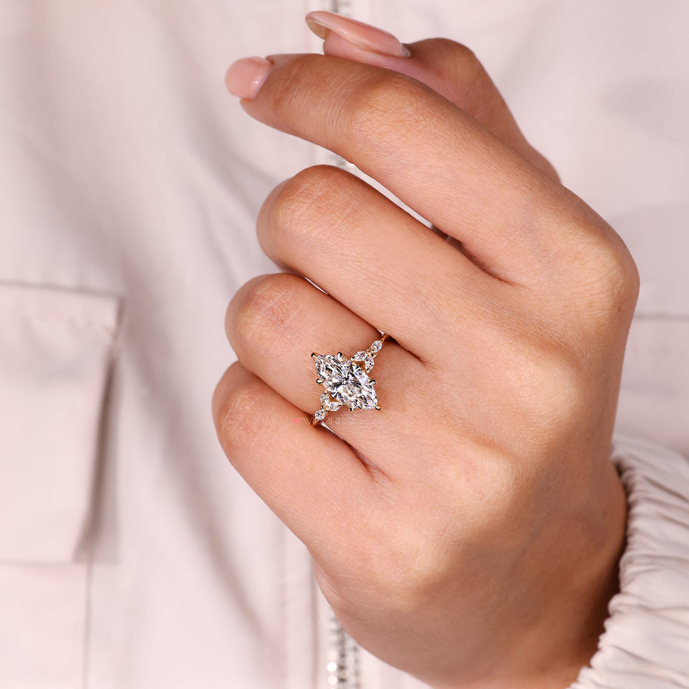 Classic marquise diamond ring with tulip setting.
