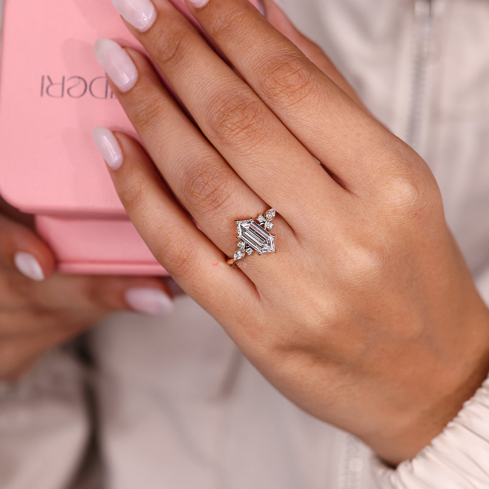 Seven stone hexagon diamond ring with twist band.
