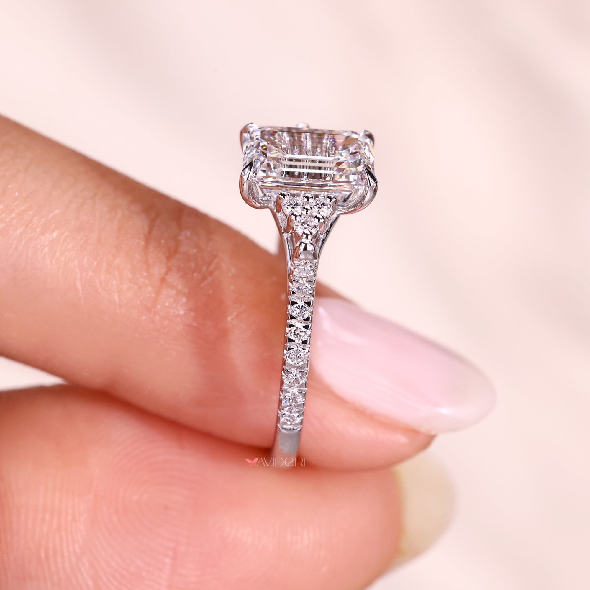Lab grown emerald cut diamond ring with muse setting.
