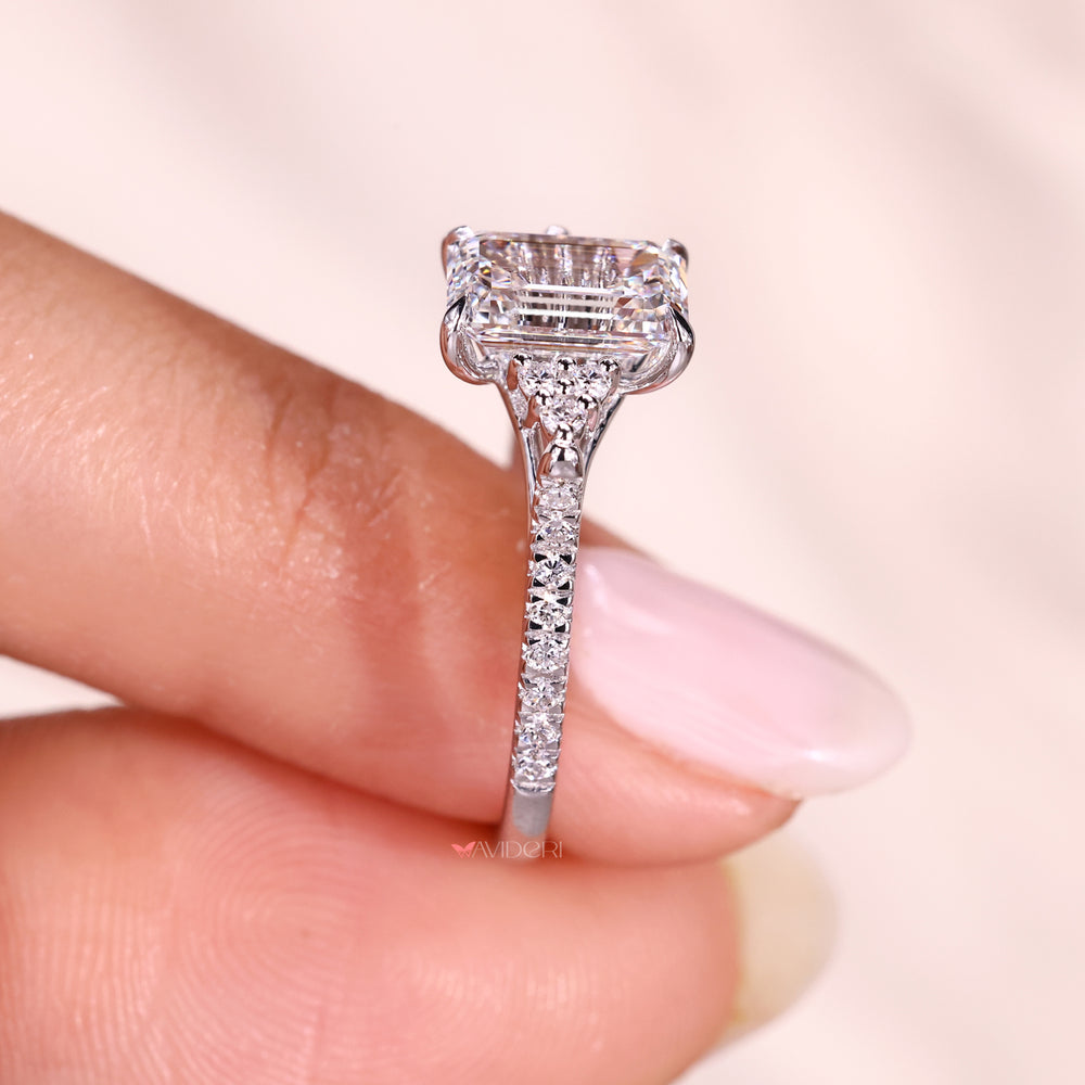 Lab grown emerald cut diamond ring with muse setting.

