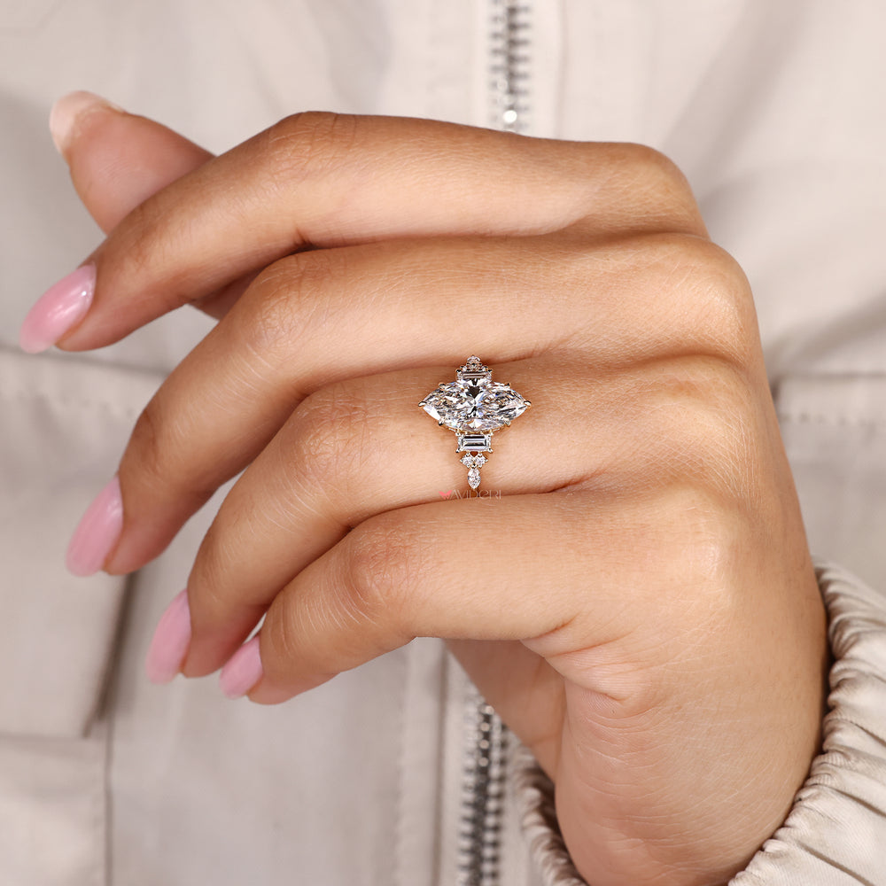 Six claw prong marquise diamond engagement ring.
