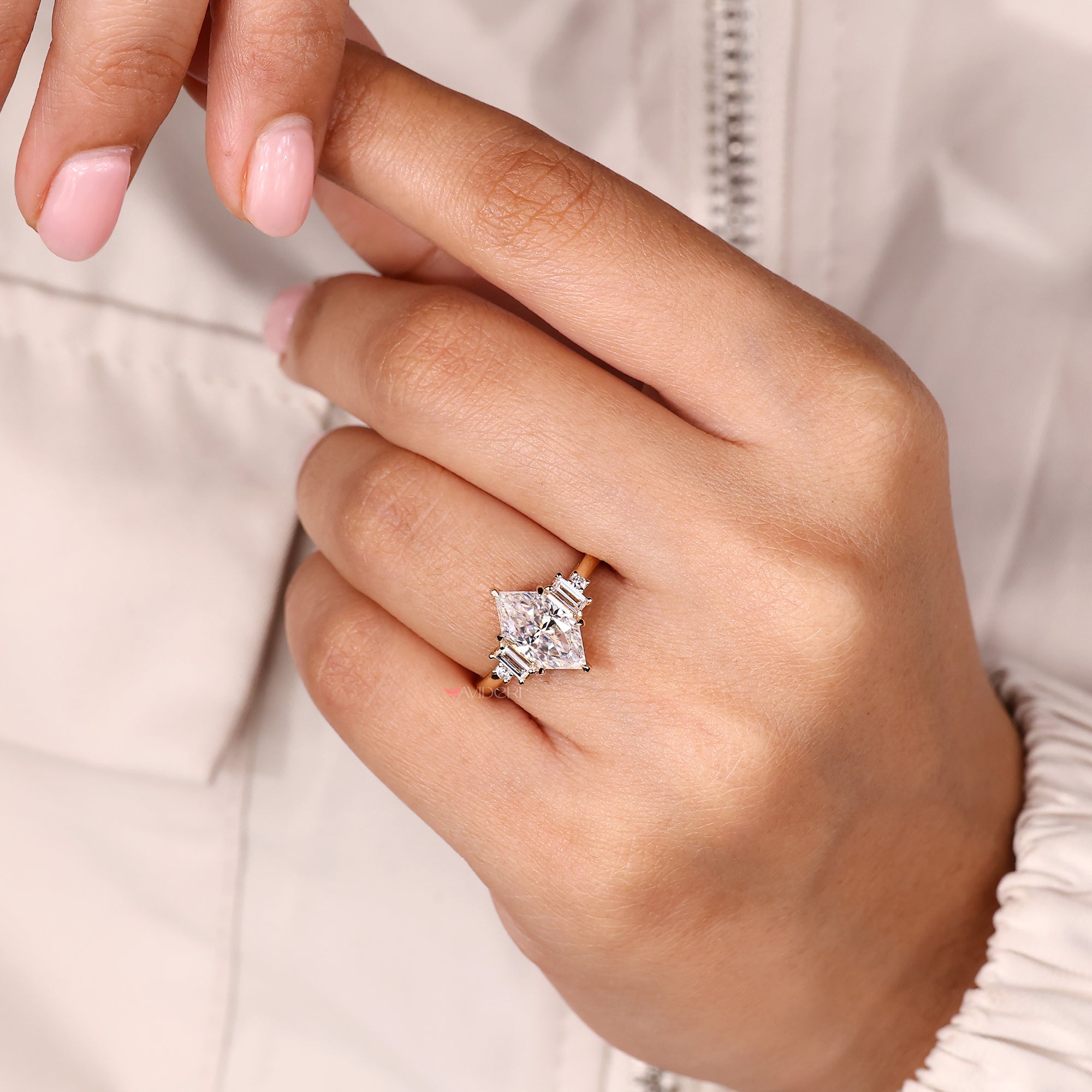 Dutch marquise engagement ring in muse setting design.