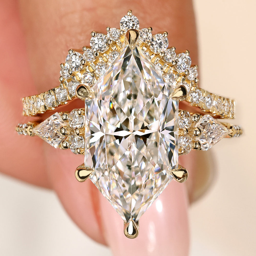 Dutch marquise diamond ring with curved band.
