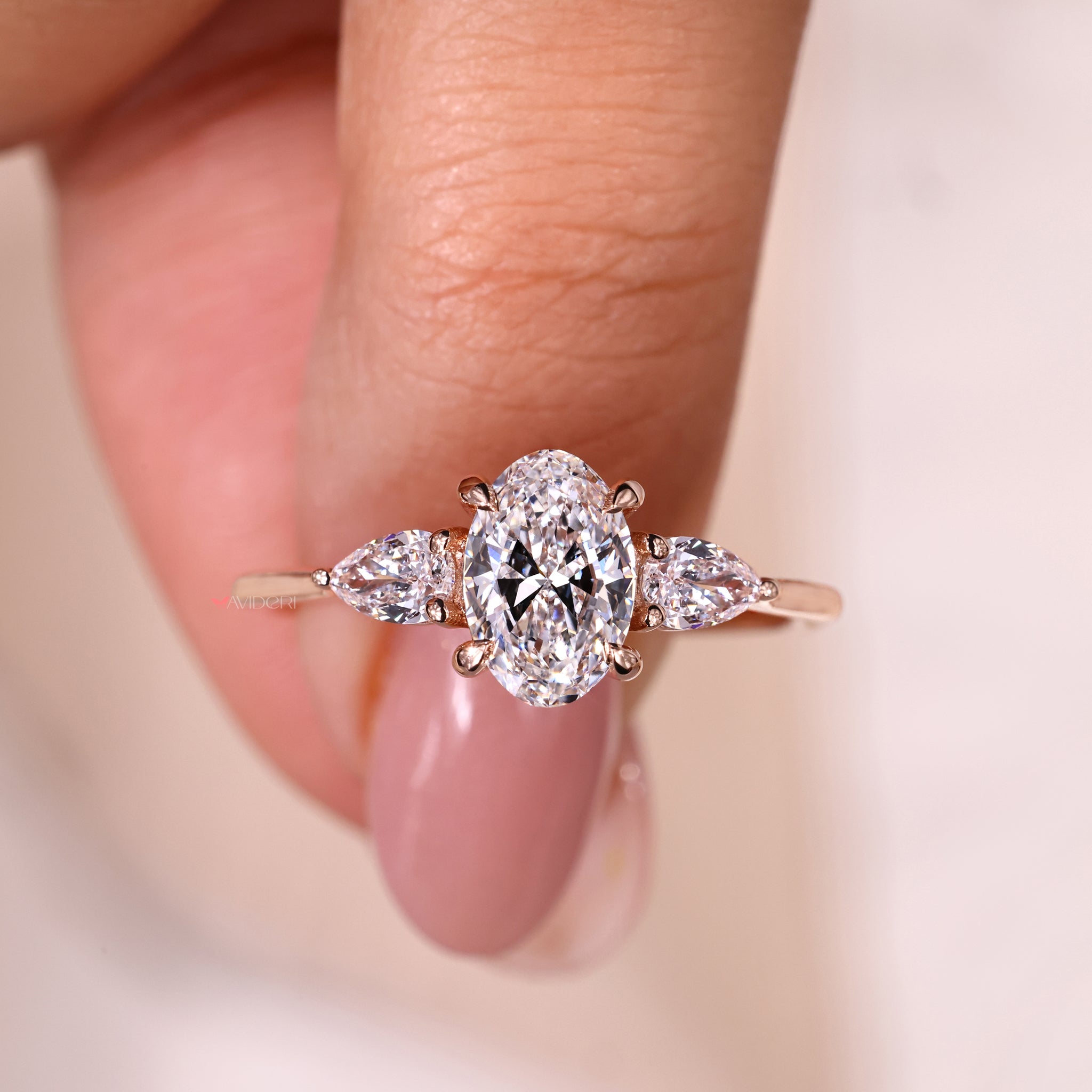 pear shaped ring, three stone engagement ring, 4 prong ring

