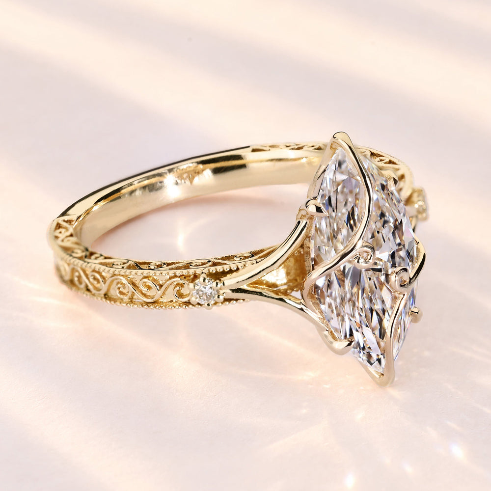 Marquise cut ring with nature inspired details.
