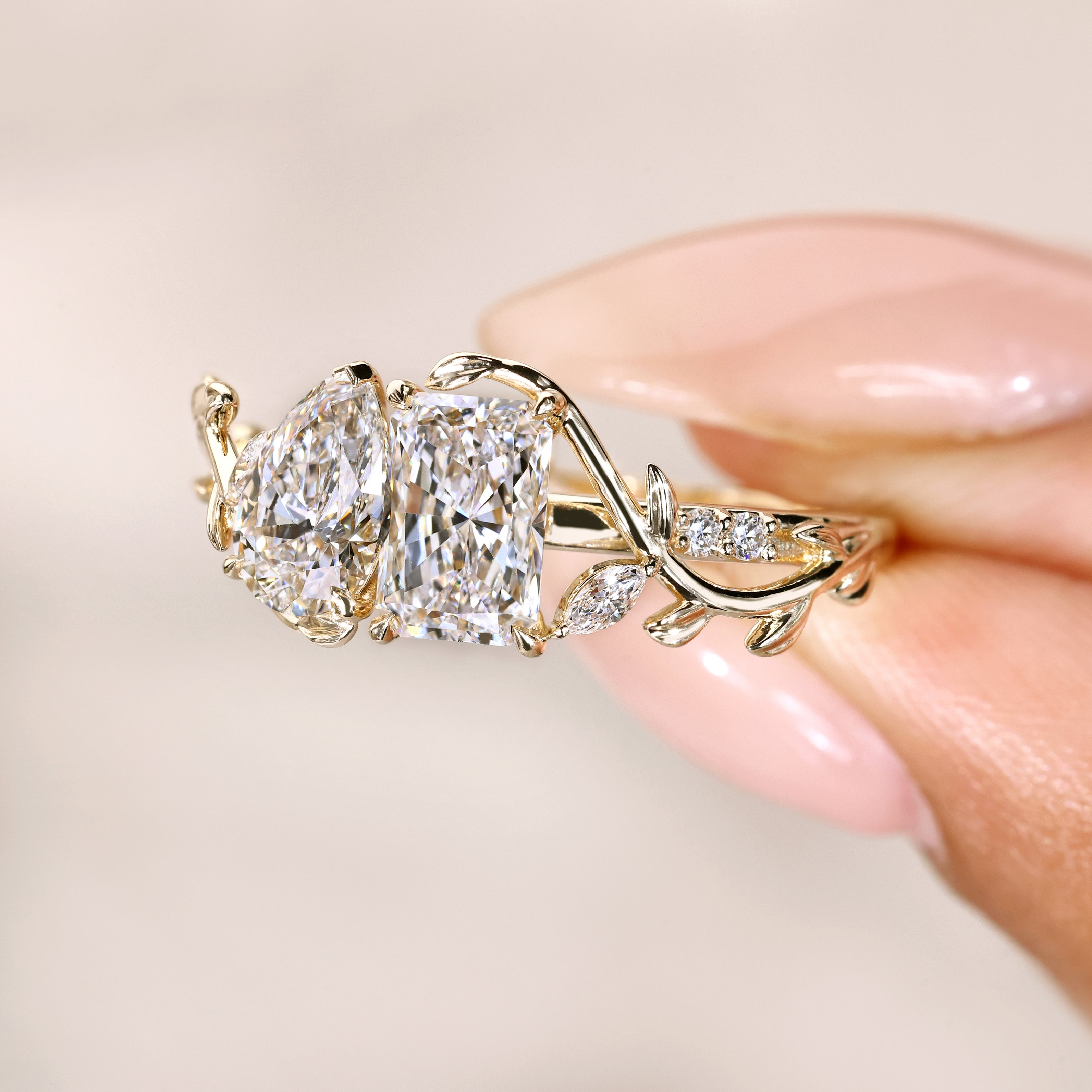 Pear and radiant cut toi et moi diamond ring.
