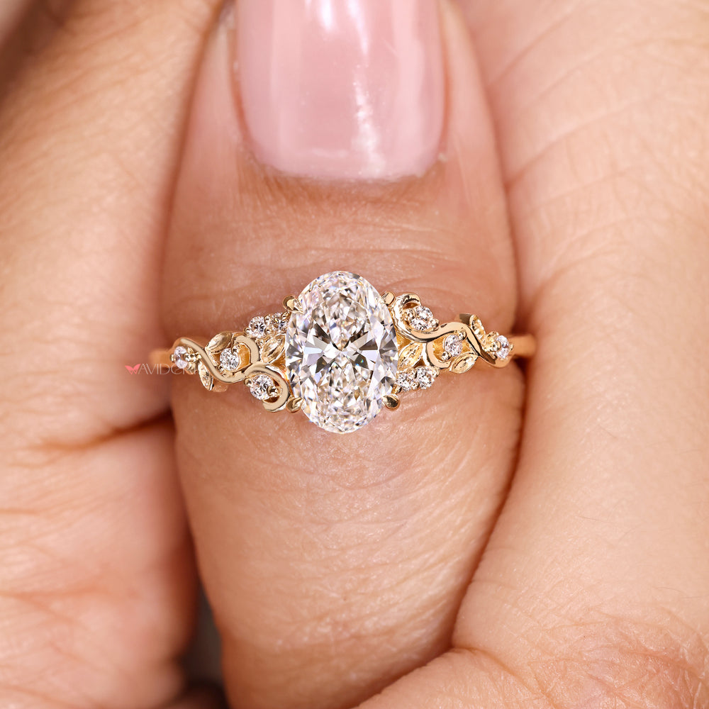 Nature inspired oval ring with diamonds.
