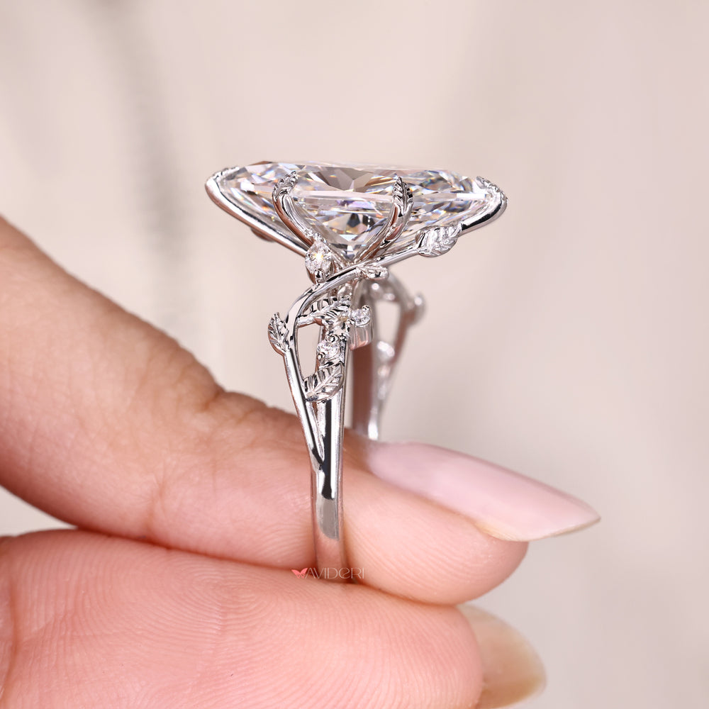 Nature inspired marquise diamond ring style.
