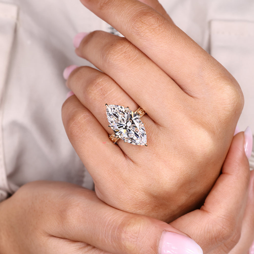 Custom diamond ring with marquise center.