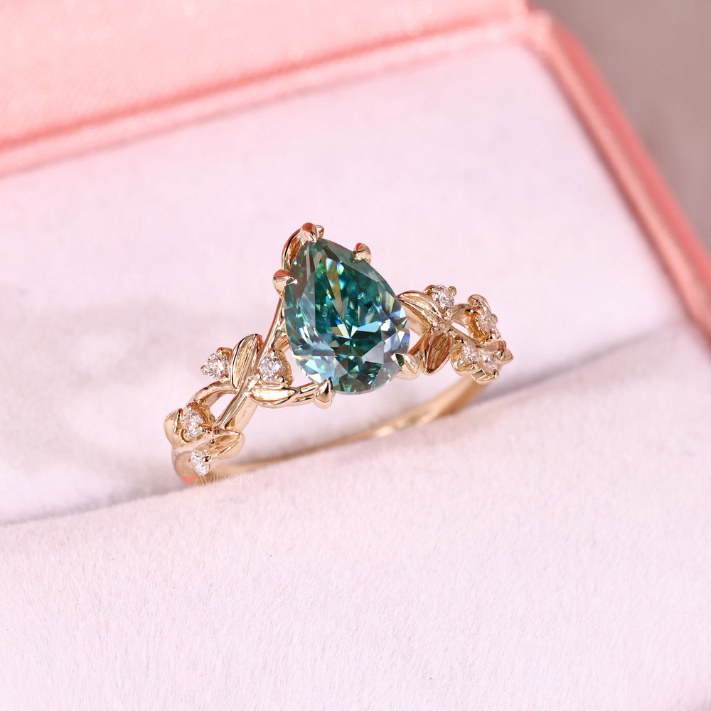 Round cut side stone with moissanite engagement ring.