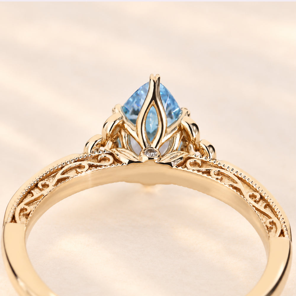 Fantasy pear cut ring with blue lab grown diamond.
