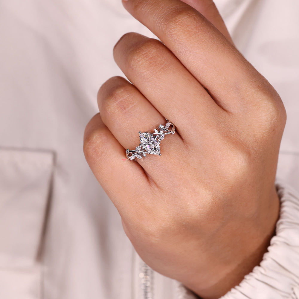 Handmade marquise diamond ring with leaf motif.
