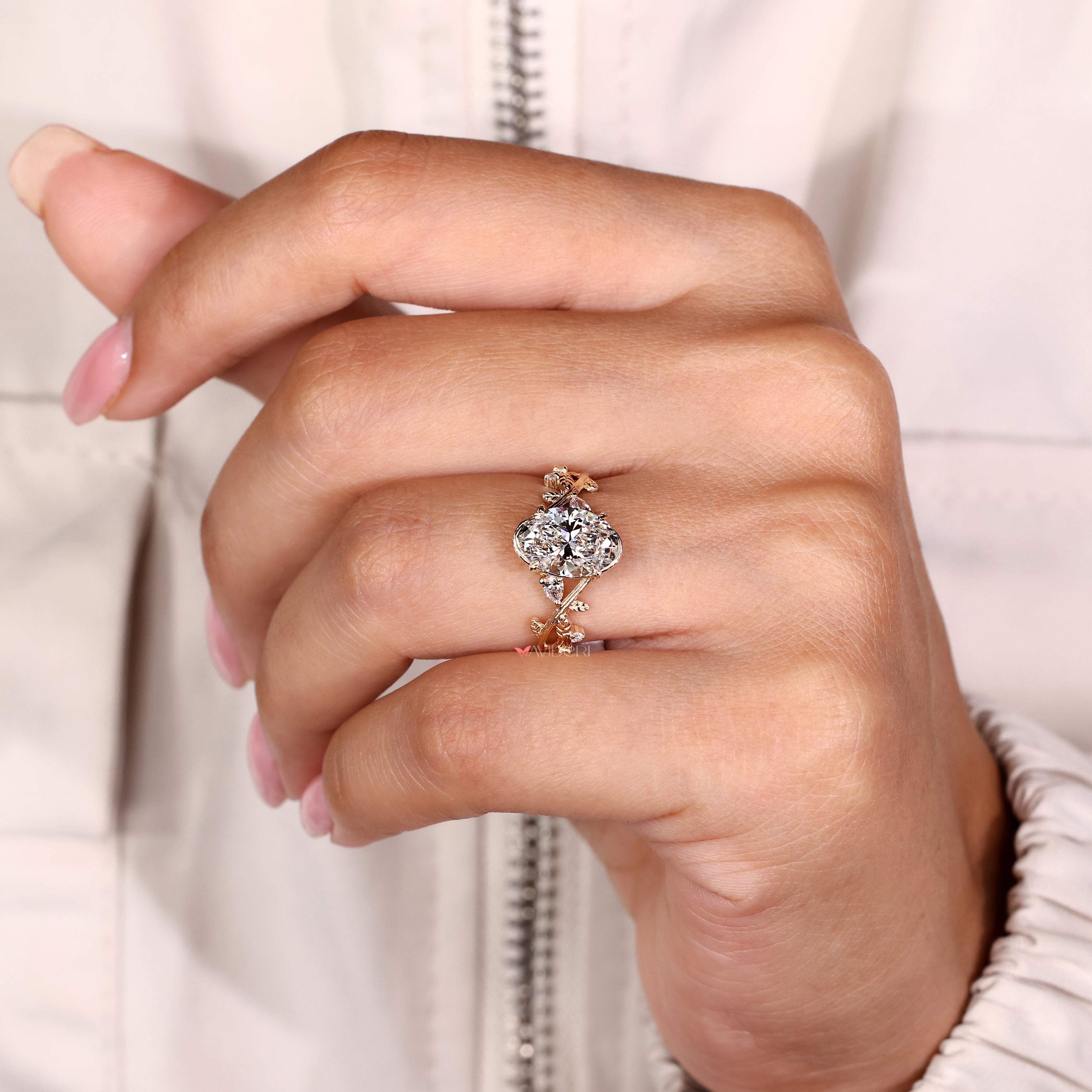 Vintage style fairy ring with oval center diamond setting
