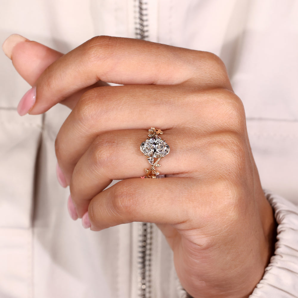 Vintage style fairy ring with oval center diamond setting
