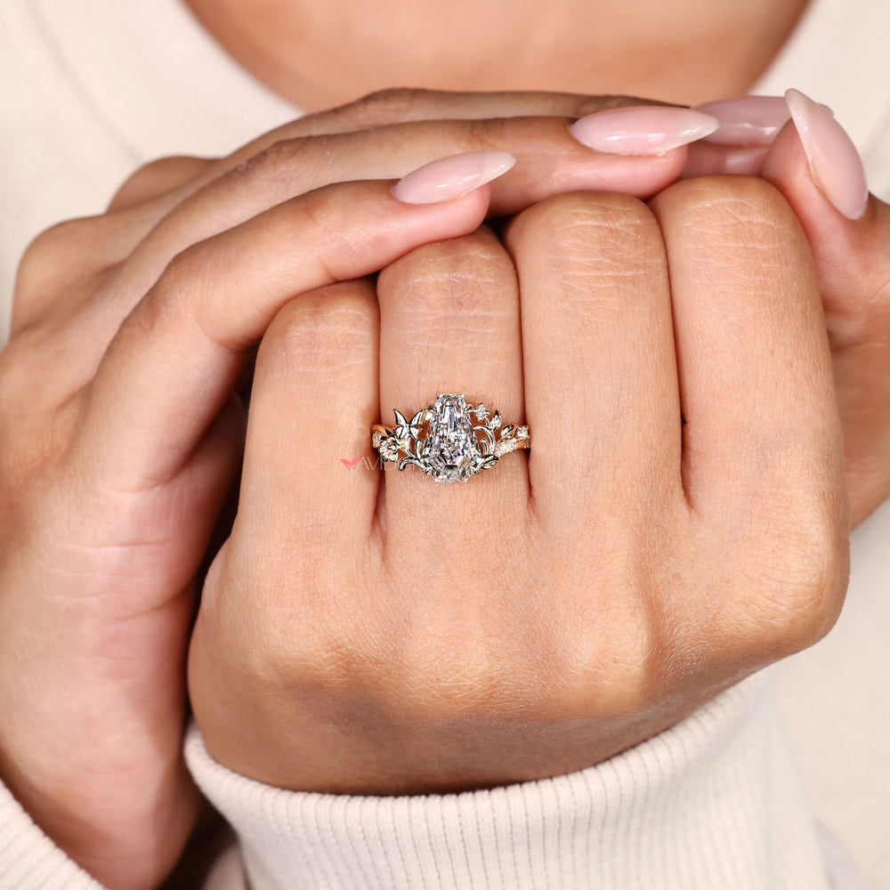 Coffin cut ring with signature butterfly design.
