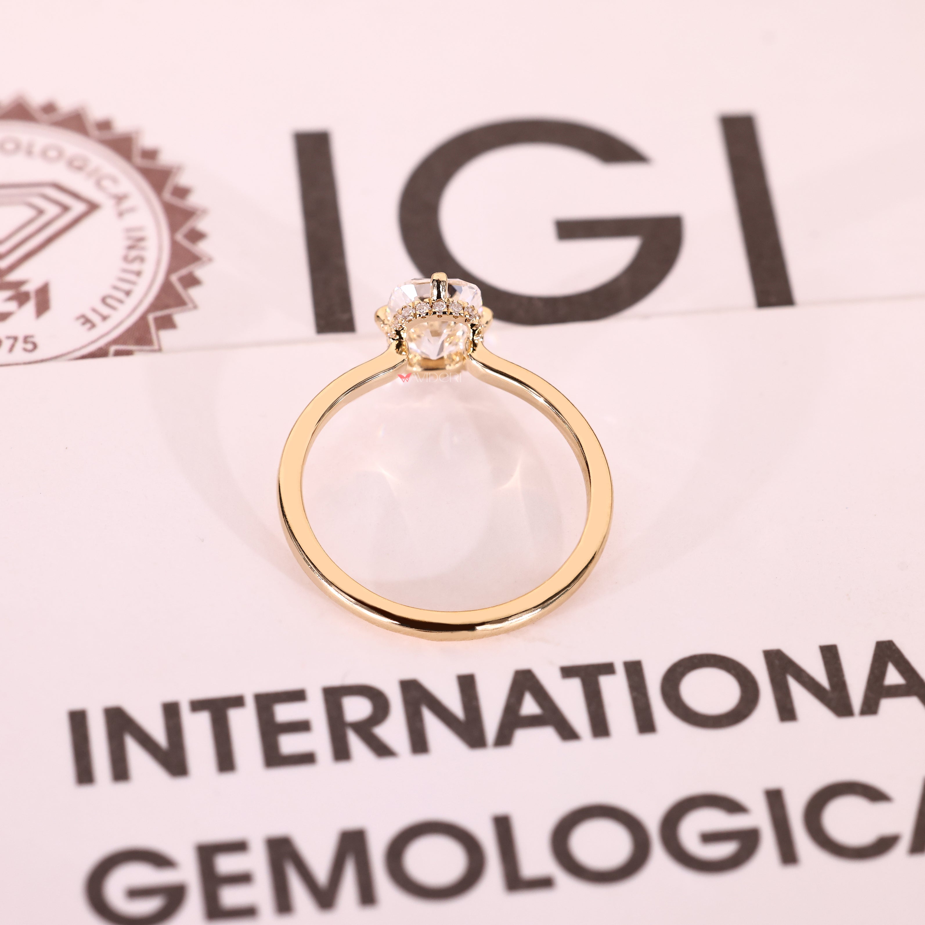 Cushion cut lab diamond ring with compass claw prongs
