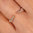 Round diamond wedding band in yellow gold.