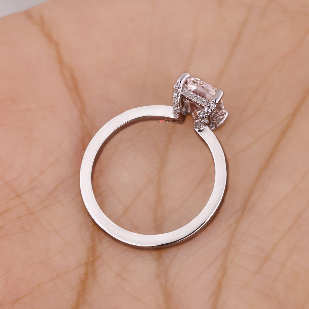 Round diamond ring with a hidden halo and a white gold band.


