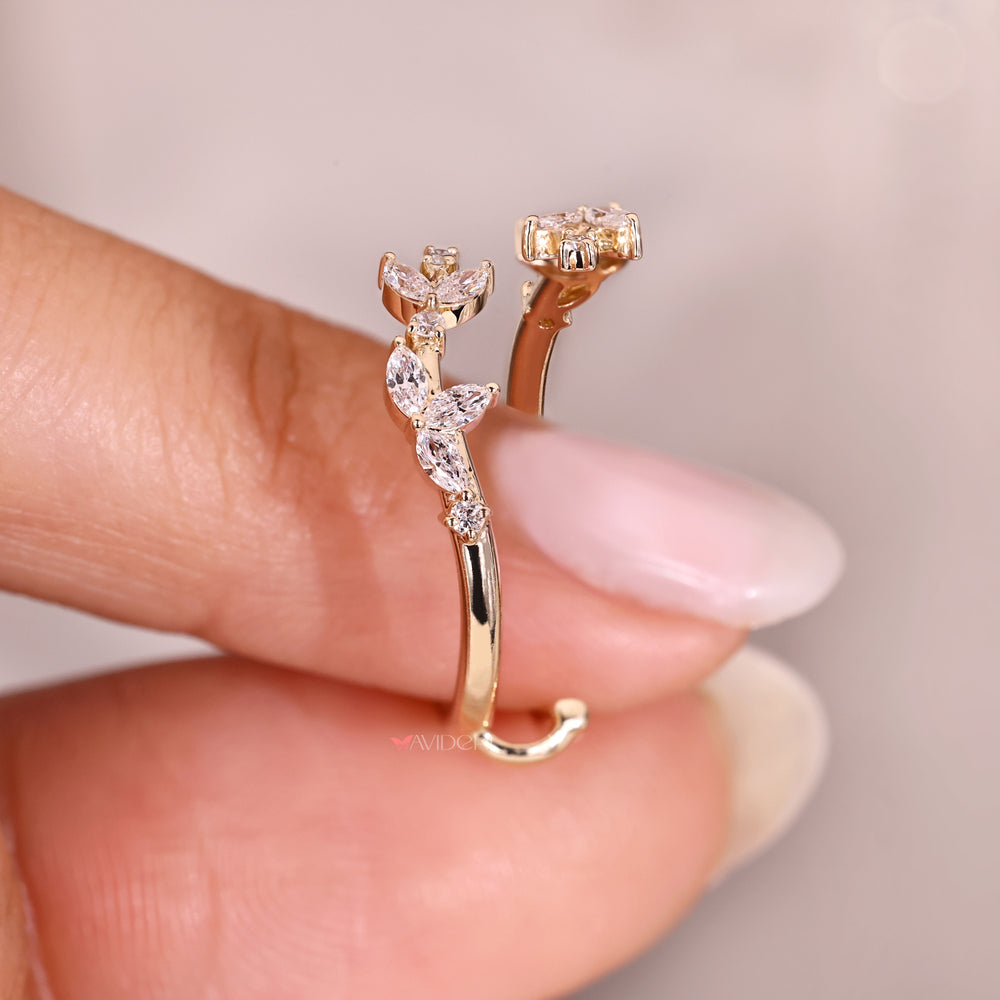 Floral marquise and round diamond enhancer ring.
