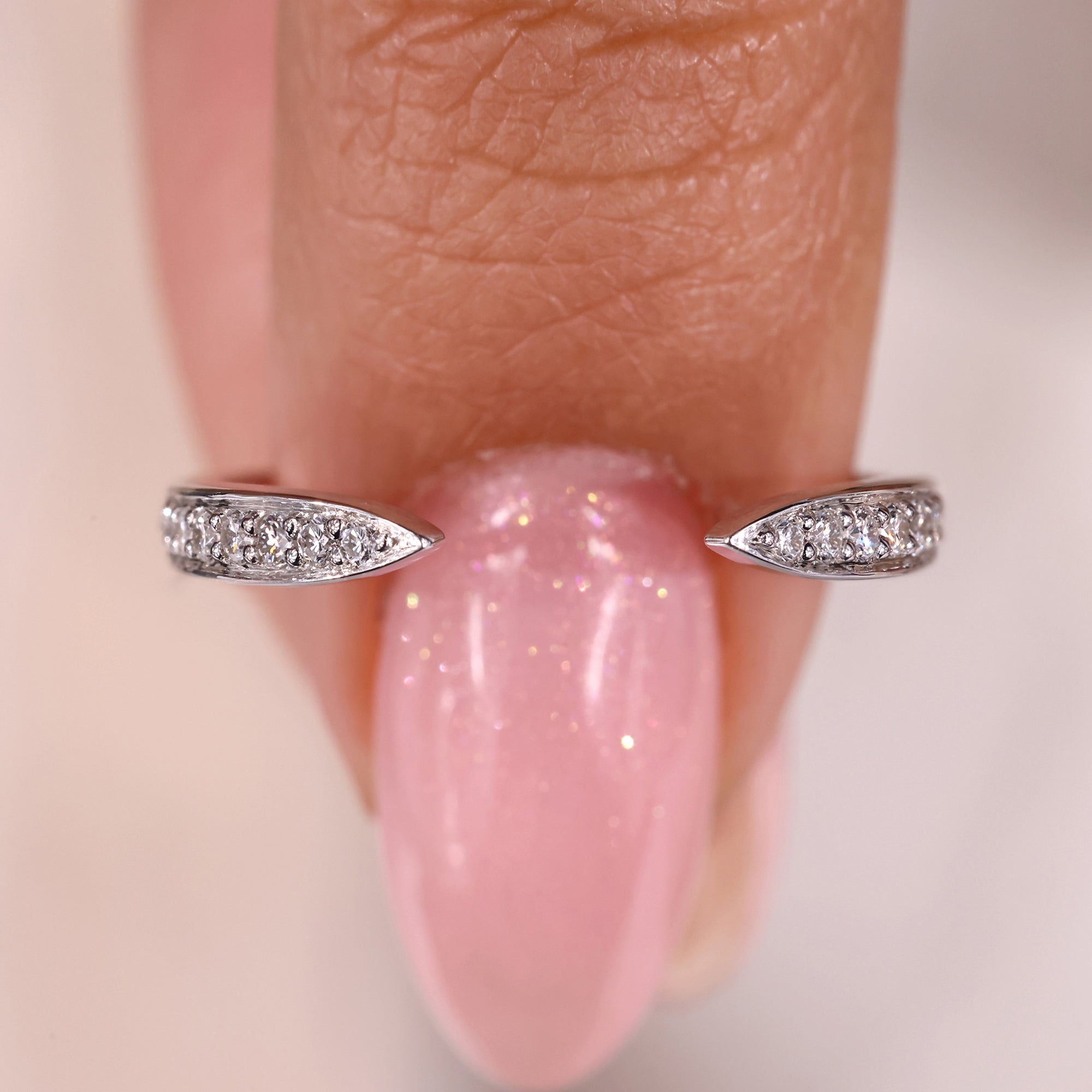 Open gap wedding band with round cut wedding band.