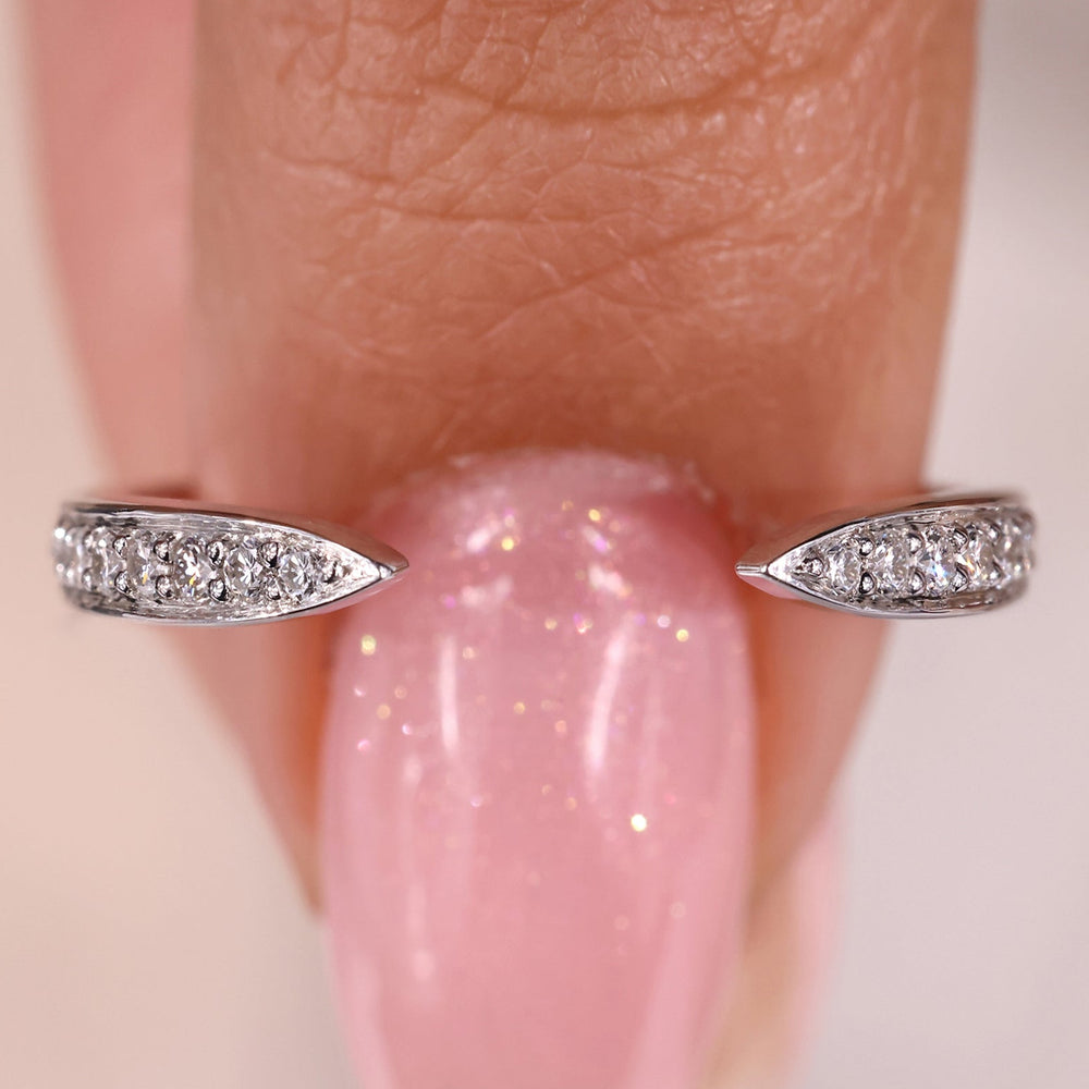 Open gap wedding band with round cut wedding band.