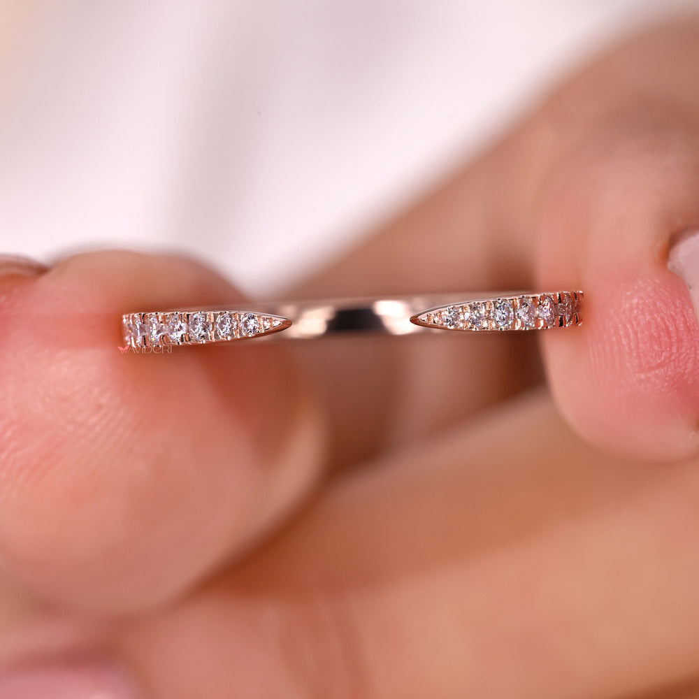 Matching wedding band with half eternity diamond arrangement in rose gold
