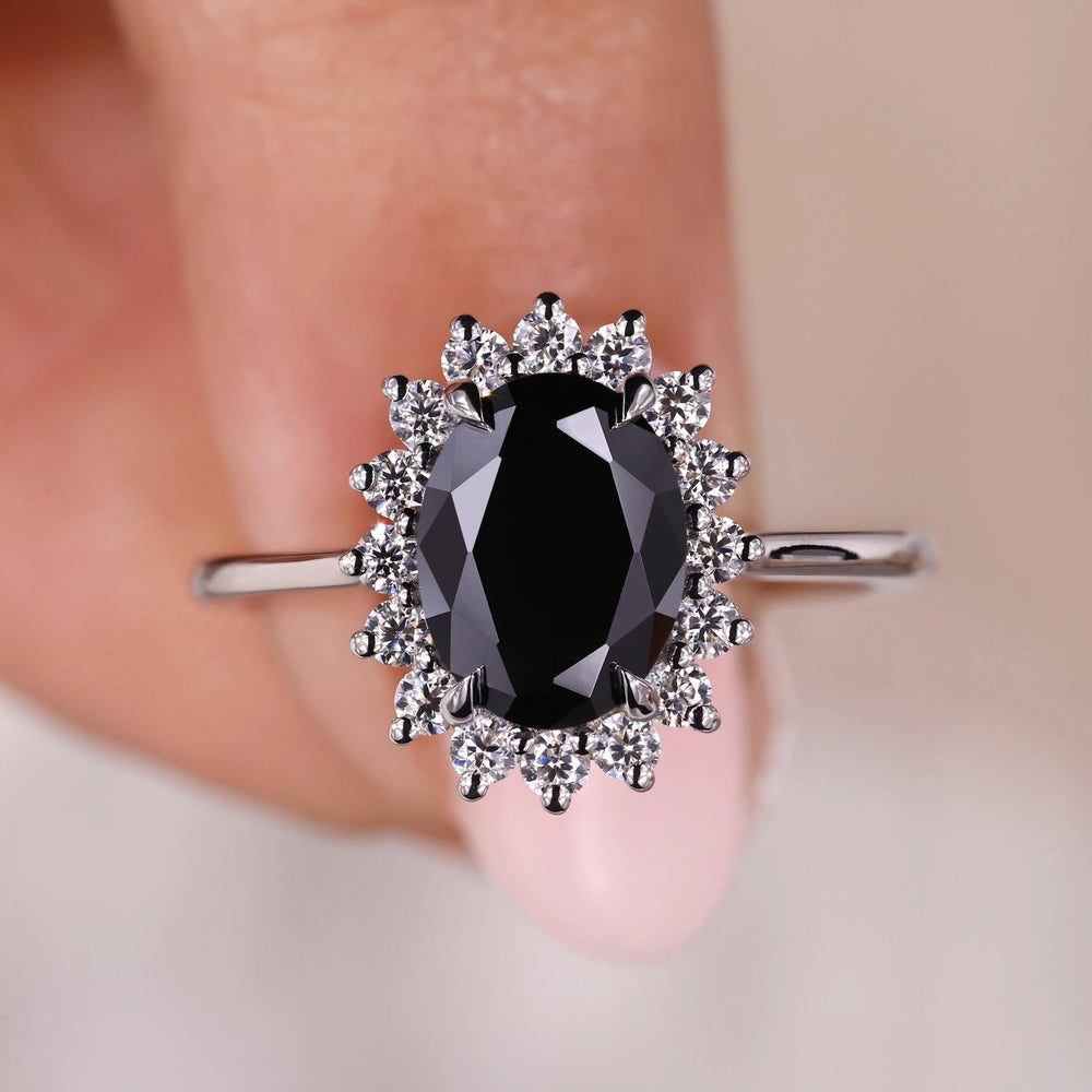 Oval moissanite engagement ring in a classic design.