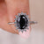 Oval moissanite engagement ring in a classic design.