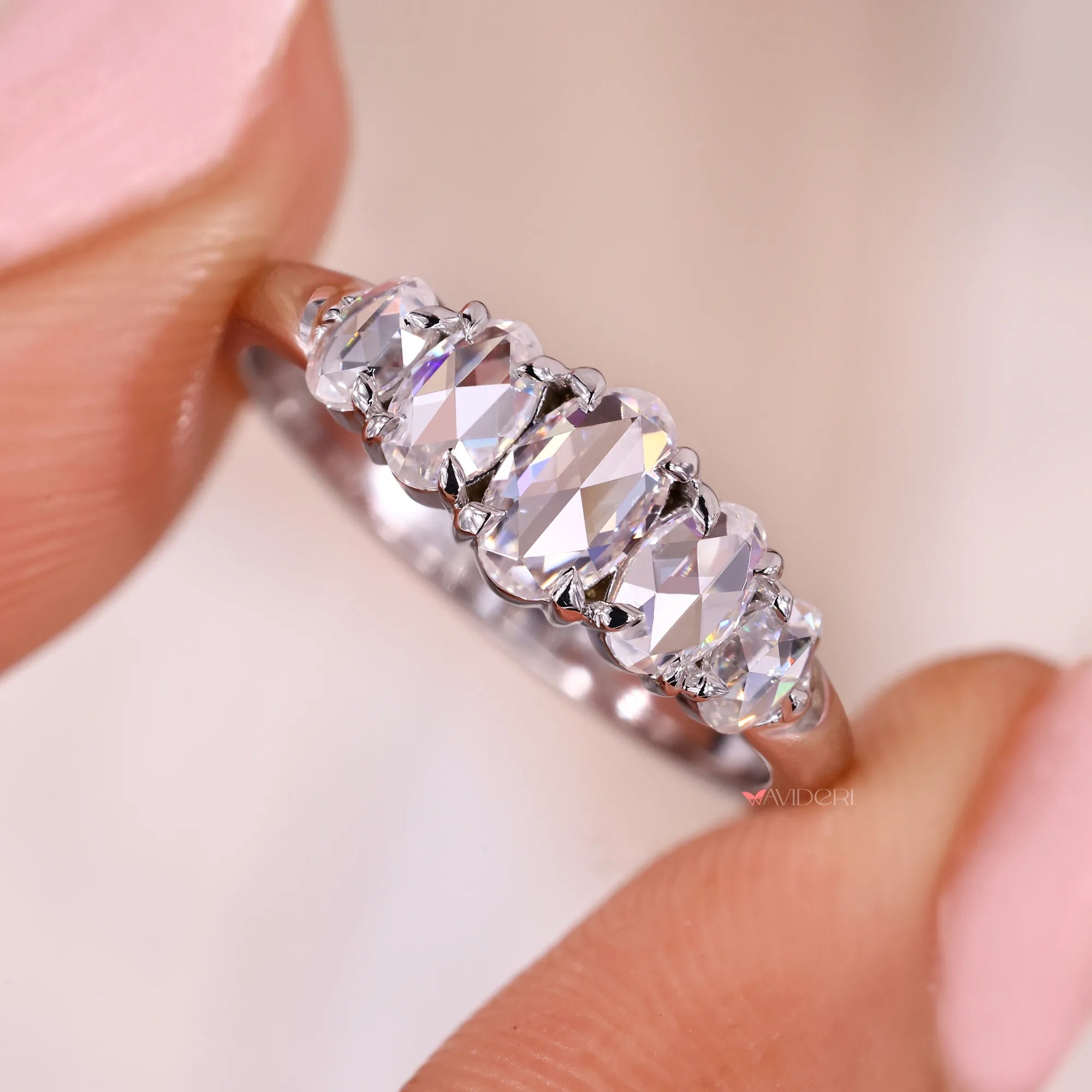 Claw prong setting with custom wedding band.