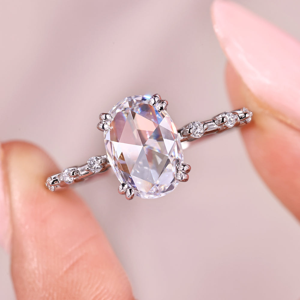 Double prong setting with distance pave setting.