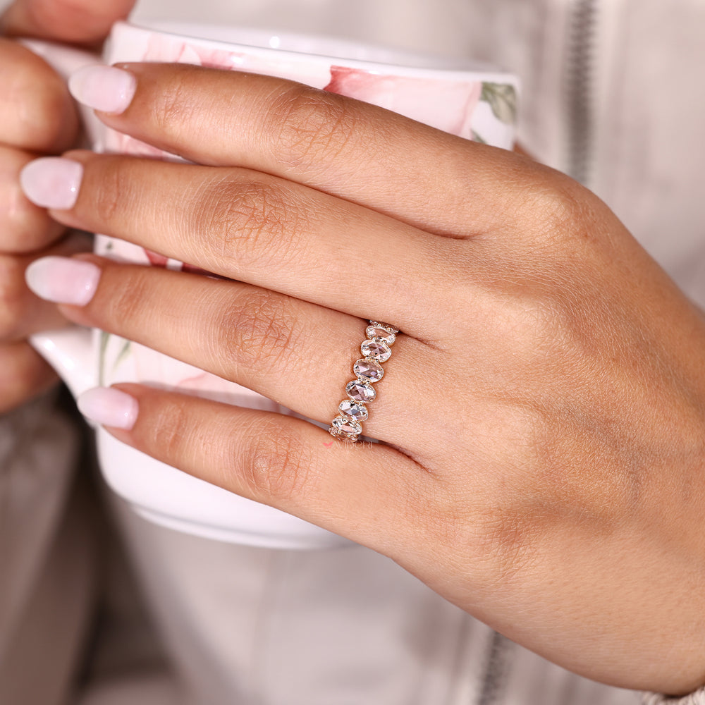 Oval rose cut diamond eternity band design.
